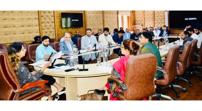 Yasha Mudgal chairing a meeting on Saturday.