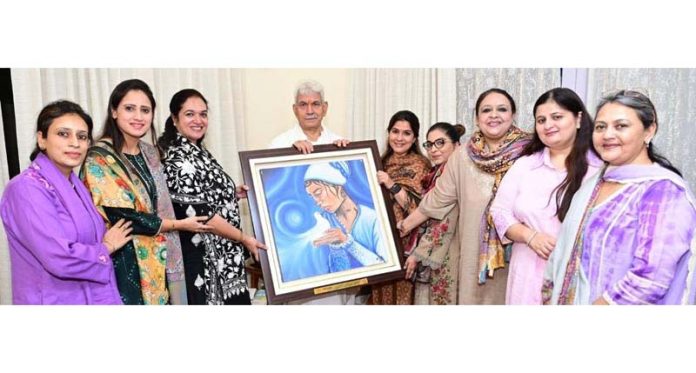 Lt Governor Manoj Sinha posing with delegation of FLO JKL Chapter on Friday.