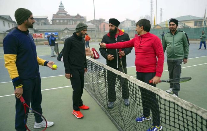 Players during ‘Decathlon Chillai-Kalan Tennis Carnival’ at Gindun Stadium Rajbagh in Srinagar on Saturday. - Excelsior/Shakeel