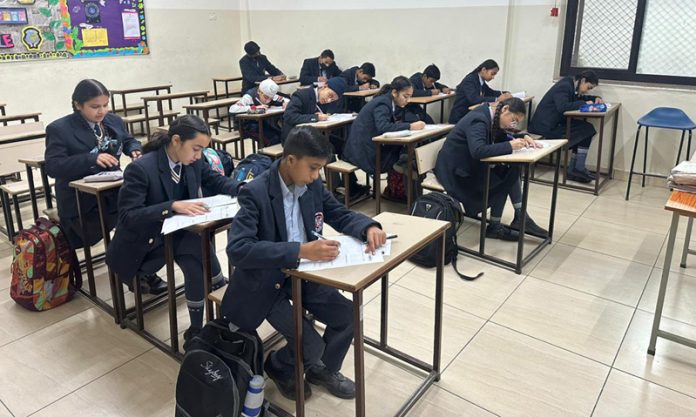 Students appearing in a scholarship exam conducted by Padhoji at its Gandhi Nagar centre in Jammu.