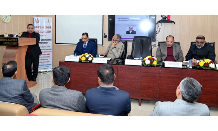 A legal luminary addressing Registrars and Sub-Registrars during a sensitisation program in Jammu on Saturday.