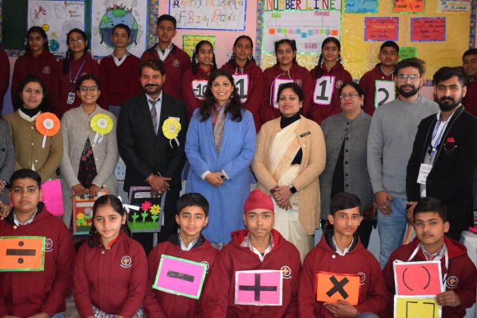 Students posing with teaching faculty and jury members on Saturday.