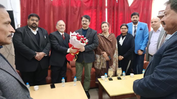 Members of Tax Bar Association during their meeting with Commissioner Taxes P K Bhat in Jammu on Friday.