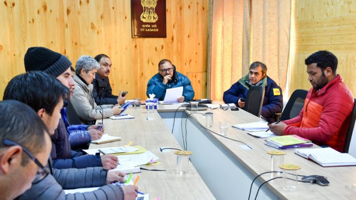 Dr Pawan Kotwal chairing review meeting at Civil Secretariat Leh.