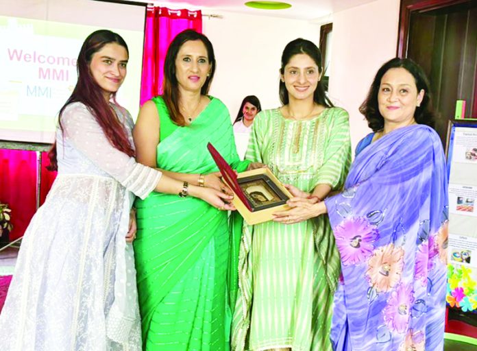 Director MMI Preschool Sapna Rohmetra & Principal Pragya Gupta presenting memento to Shria Abrol, RCI, Counsellor on Saturday.