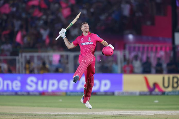 Jos Buttler celebrating his centurey against RCB at Jaipur on Saturday.