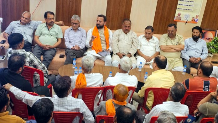 Members of Bazaar Mandal Khour and others during a meeting on Saturday.