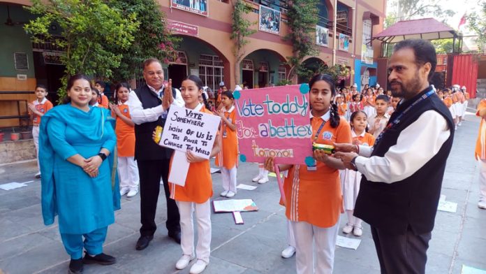 Students of SNS during a voting awareness rally organised in Jammu on Saturday.