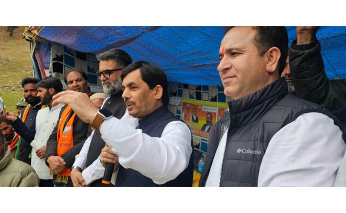 BJP national spokesperson, Shahnawaz Hussain addressing a public rally at Choidraman in Warwan area of Kishtwar district on Saturday.-Excelsior/ Tilak Raj