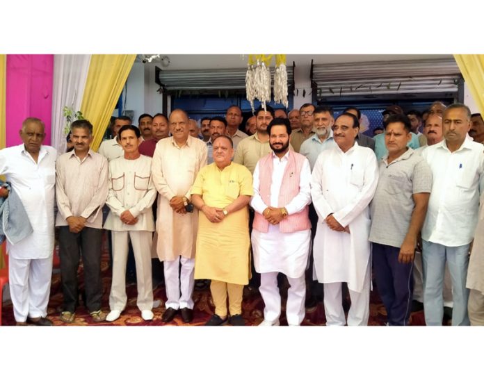 Senior Cong leaders Mula Ram, Hari Singh Chib and others during election meeting in Marh on Saturday.