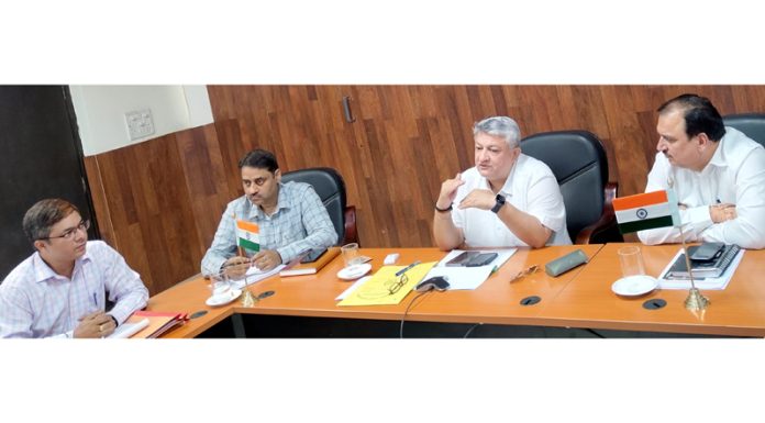 DDC Reasi Vishesh Mahajan chairing a meeting on Saturday.