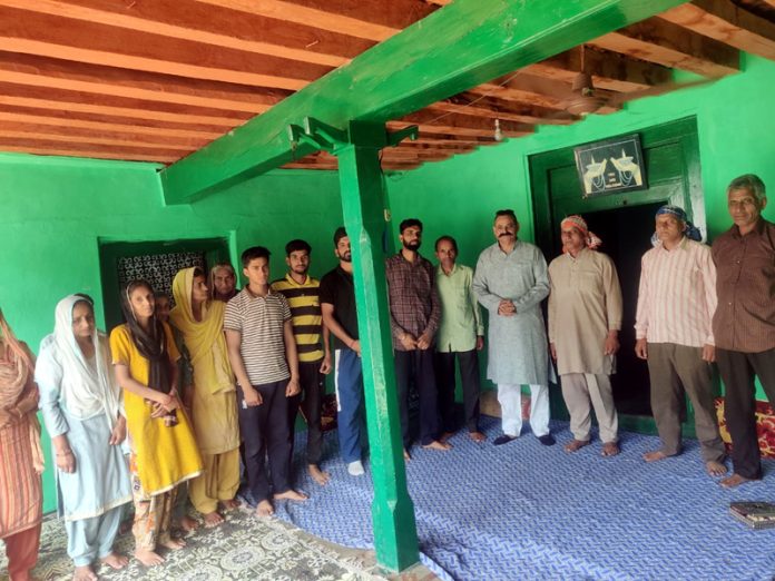 Apni Party provincial secretary Dr Rohit Gupta along with villagers at Mangnar in Poonch district.