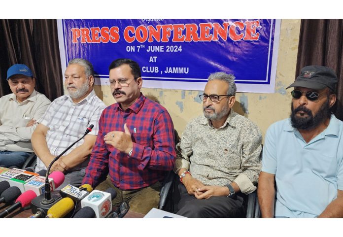 Noted dramatist, Dr. Sudhir Mahajan along with others addressing a press conference at Jammu on Friday. -Excelsior/Rakesh