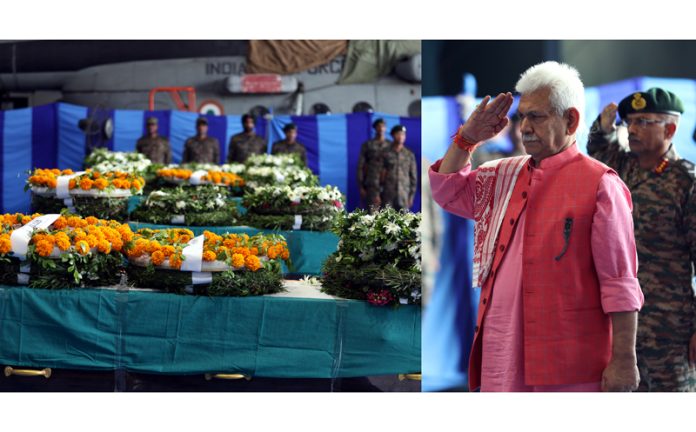 LG Manoj Sinha pays tribute to bravehearts at wreath laying ceremony at Technical Airport in Jammu on Tuesday. -Excelsior/Rakesh