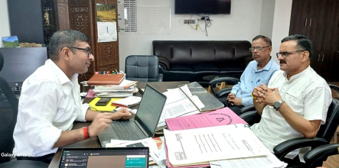 Former Councilor and senior BJP leader Sanjay Baru during a meeting with JMC Commissioner, Rahul Yadav at Jammu on Saturday.