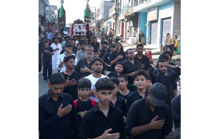 Mourners participating in Moharram procession in Jammu on Saturday. -Excelsior/Rakesh