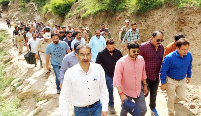 DC Kishtwar Dr. Devansh Yadav alongwith others during visit to Machail on Sunday.