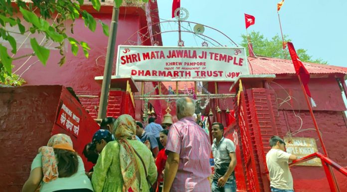 Devotees paying obeisance to Goddess Jawala Ji at Khrew on Saturday.