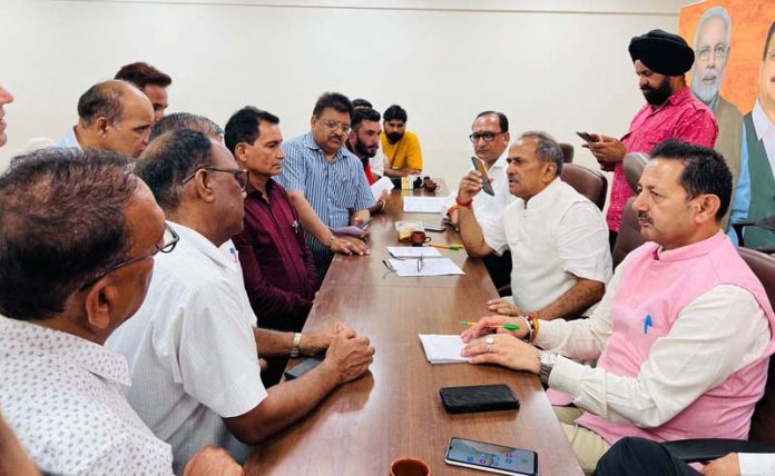 BJP leaders listening public grievances at party office Jammu on Monday.