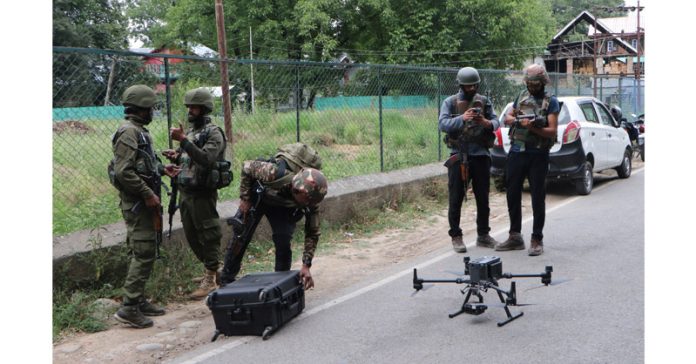 A drone being used at the encounter site at Modergam, Kulgam. — Excelsior/Sajjad Dar