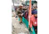 Yatris waiting in long queues at holy cave for darshan on Wednesday.