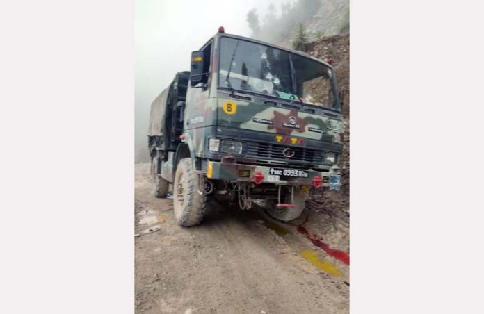 An Army truck which was targeted by the terrorists at Badnota, Billawar on Monday. -Excelsior/Pradeep