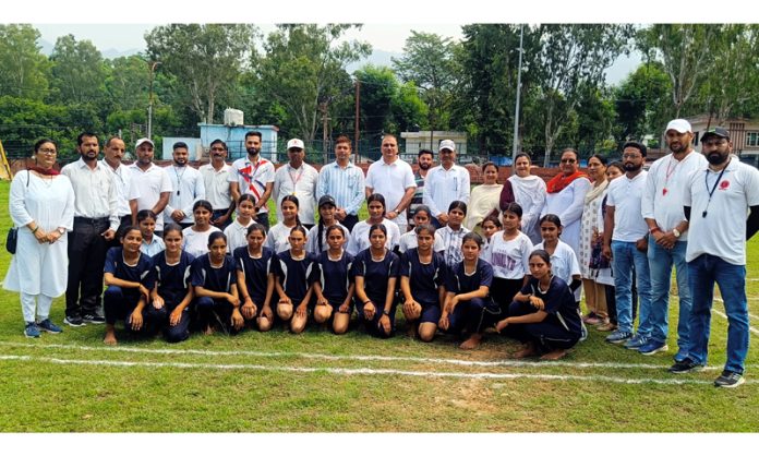 Dignitaries posing along with players in Reasi on Friday.