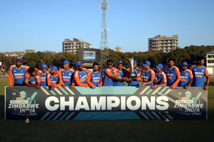 Indian cricket team posing with trophy after defeating Zimbabwe at Harare on Sunday.