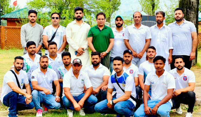 Senior NC leader Tanvir Sadiq posing with Dal Lake Rowers.