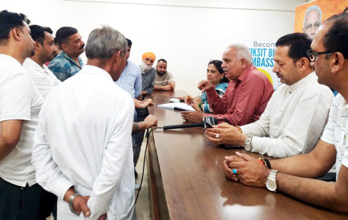 BJP leaders listening public grievances at party office Jammu on Monday.