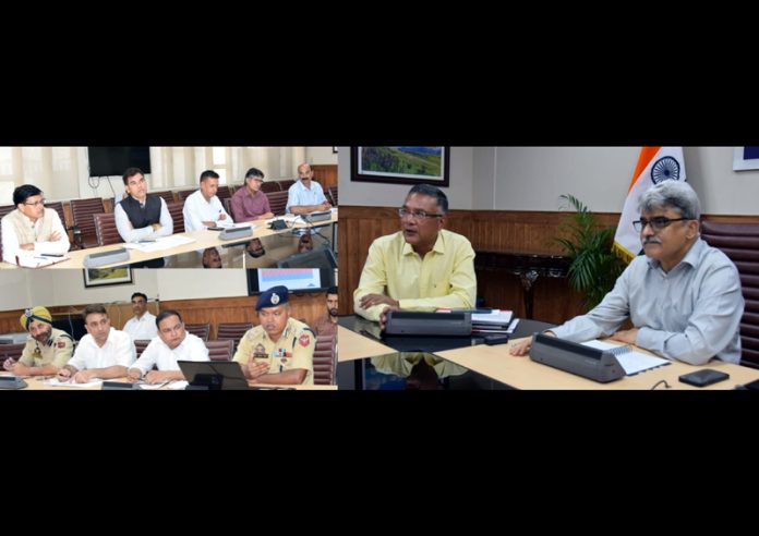 Chief Secretary Atal Dulloo chairing a meeting on Monday.