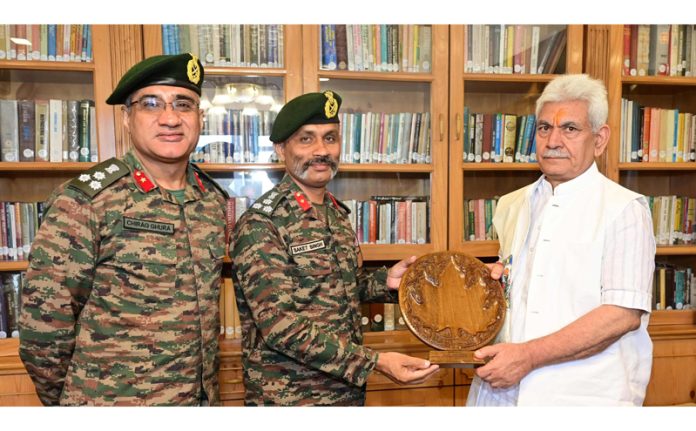 Lt Governor Manoj Sinha meeting Brig. Saket Singh at Raj Bhawan.