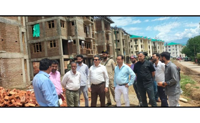 R&R Commissioner (M) Dr Arvind Karwani inspecting under construction accommodations in South Kashmir.