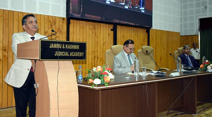 Justice Sanjeev Kumar speaking during sensitization prog for Judicial Officers.