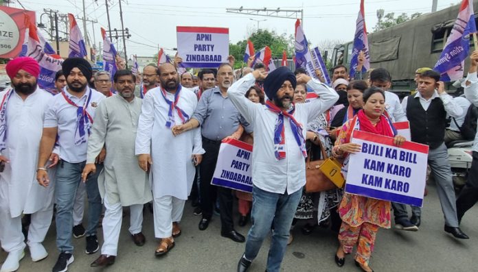 Apni Party activists staging protest against PDD in Jammu. -Excelsior/Rakesh