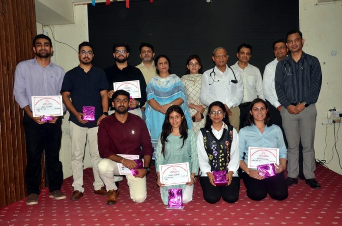 Dignitaries posing for a group photograph at ASCOMS & Hospital in Jammu after celebrating World ORS Day 2024.