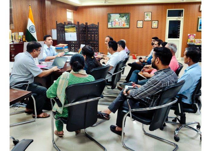 DC Kathua Dr Rakesh Minhas chairing a meeting on Tuesday.