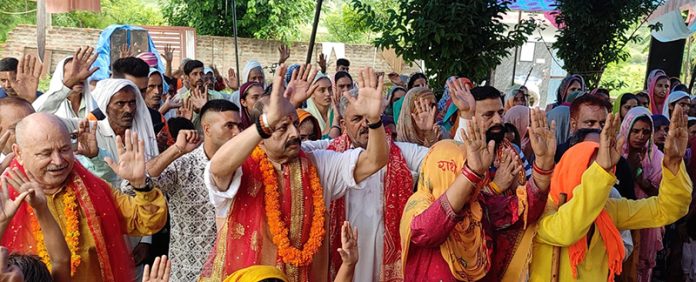 Senior BJP leader Devender Singh Rana attending a religious function.