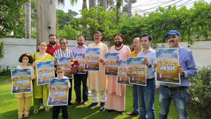 MP Jugal Kishore Sharma releasing poster of Dogri song at Jammu on Saturday.