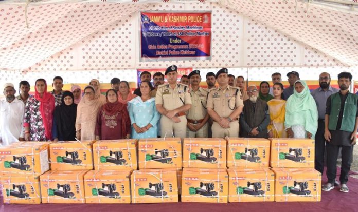 SSP Kishtwar, Abdul Qayoom along with NoKs of martyrs after giving them sewing machines under CAP.