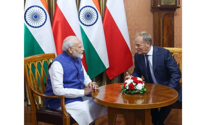 Prime Minister Narendra Modi meets Prime Minister of Poland Donald Tusk, in Warsaw, Poland on Thursday. (UNI)