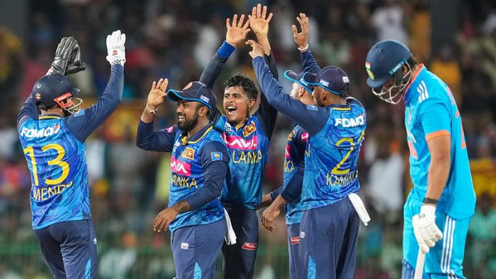 Sri Lanka cricket team celebrating victory against India at Colombo on Sunday.