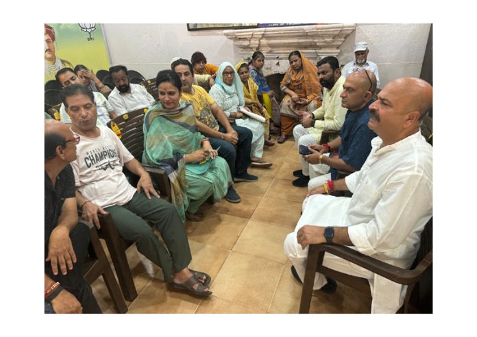 BJP vice president, Yudhvir Sethi listening public grievances at Jammu on Thursday.