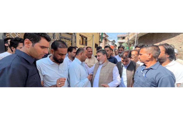 Altaf Bukhari meeting with people during canvassing in Rawalpora.