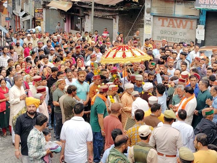 Devotees join Charri Mubarak of annual Kailash Yatra in Bhaderwah on Friday. -Excelsior/Tilak Raj