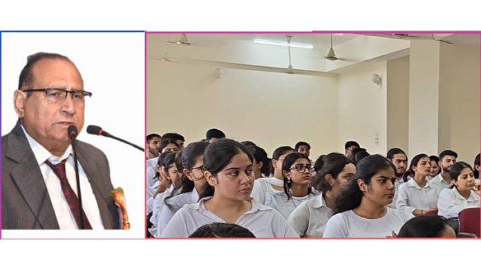 A dignitary addresses students and others at The Law School, University of Jammu on Thursday.