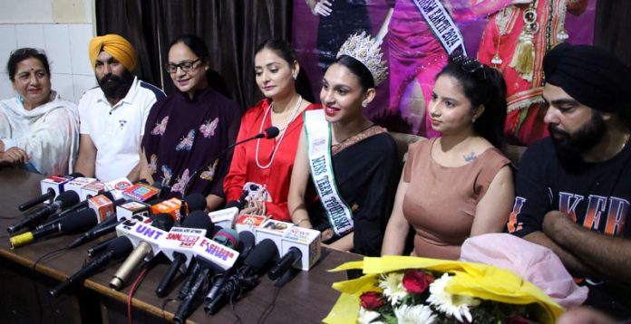 Arshdeep Kour addressing a press conference in Jammu on Friday.