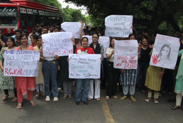 Junior doctors during a peaceful protest march in Jammu on Monday. -Excelsior/Rakesh