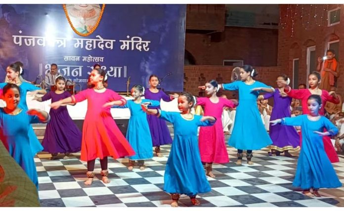 Children performing during an event organised by Panjvaktra Mahadev Mandir.