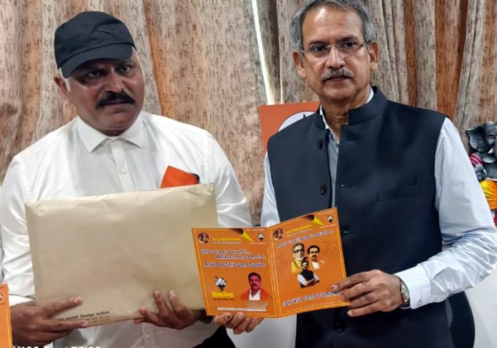 Shiv Sena MP, Anil Desai and another leader releasing party manifesto for Assembly elections in J&K.